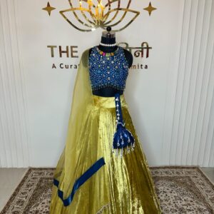 Yellow velvet lehenga and blue stone blouse