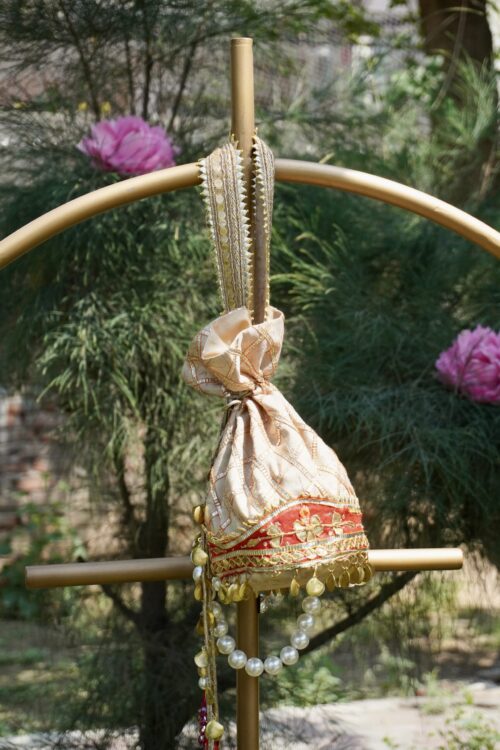 Swamini Royal Zari Pearl Bridal Potli Bag - Image 3