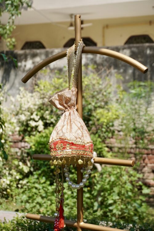 Swamini Royal Zari Pearl Bridal Potli Bag - Image 4