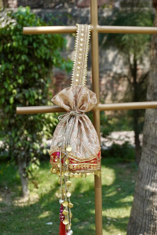 Swamini Royal Zari Pearl Bridal Potli Bag