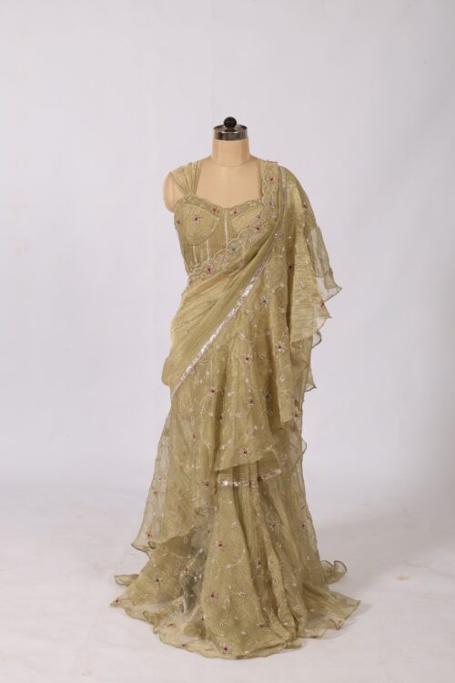 Theswamini green truffle silk saree featuring full embroidery and a designer concert blouse for women's ethnic wear.